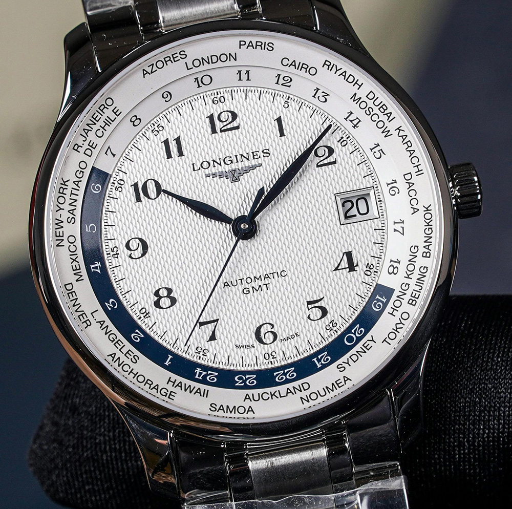 Longines watch, white dial.