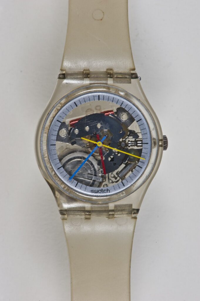 Swatch watch, 1985, with transparent body and coloured hands, photo.