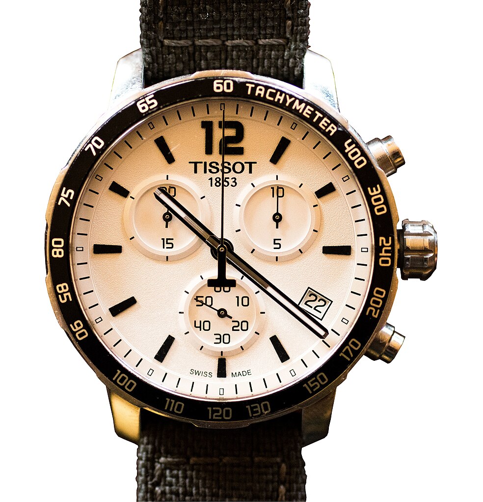 Tissot chronograph watch, white dial, black bezel, isolated on white background