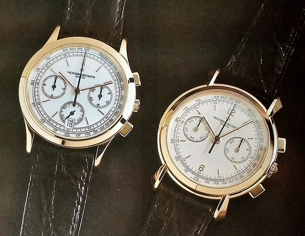 Vacheron Constantin chronograph watches, gold, on brown surface.
