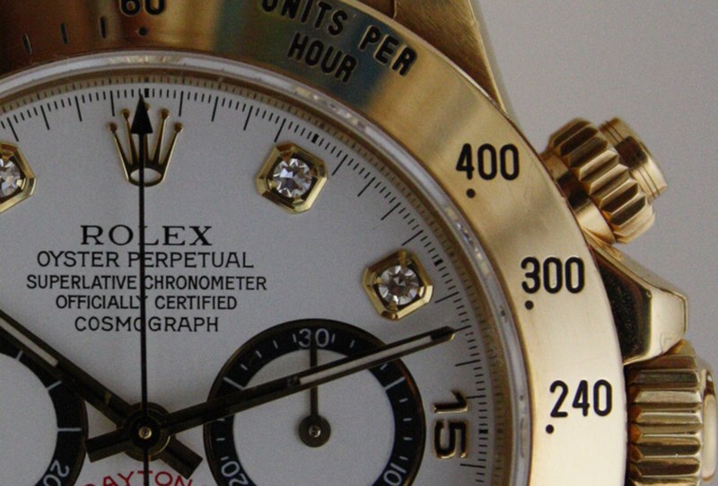aesthetic watch - Rolex Daytona (closeup/detail), with grey background