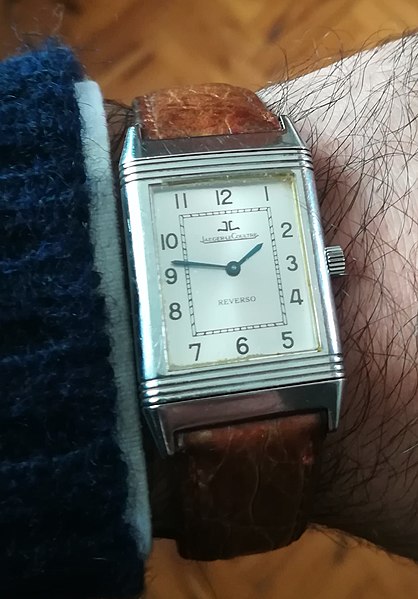 Jaeger-LeCoultre’s Reverso, shown worn on a wrist, as an example of the Golden Ratio In Watchmaking