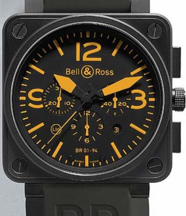 Bell & Ross BR01 watch - shaped like cockpit gauge, view from above, black dial, orange hands and markers.