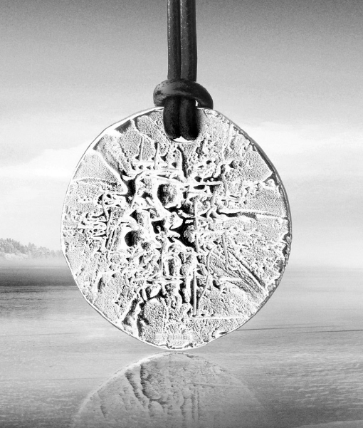 art jewellery by Björn Weckström, circular object, black-and-white