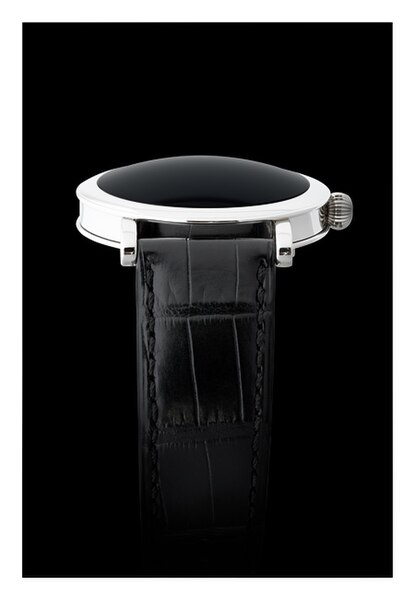 Haldimann-h9-1 watch - a timepiece which doesn't tell the time, side view, against black background.