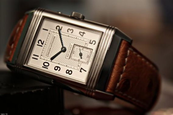 Jaeger-LeCoultre Reverso watch - a watch with a story, hero shot with blurred background.