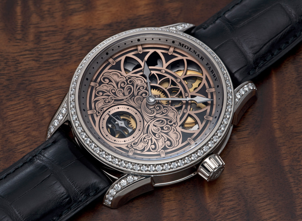 The Molnár Fábry Architectural Art Piece - aesthetic watch with art jewellery influence including gemstones, on wood surface