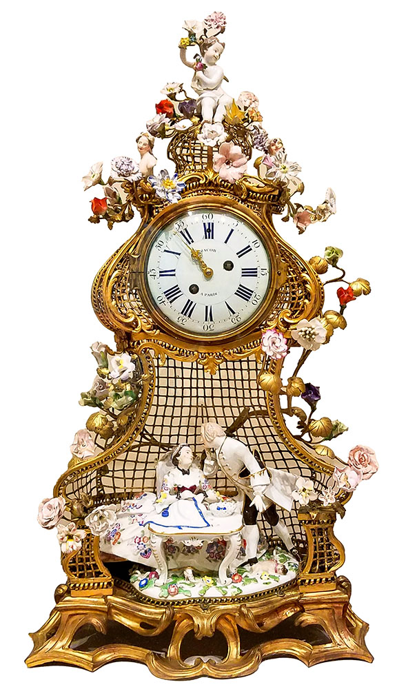 Clock, movement by Jacow, Paris, mid 1700s. with very ornate decorations, isolated against white background