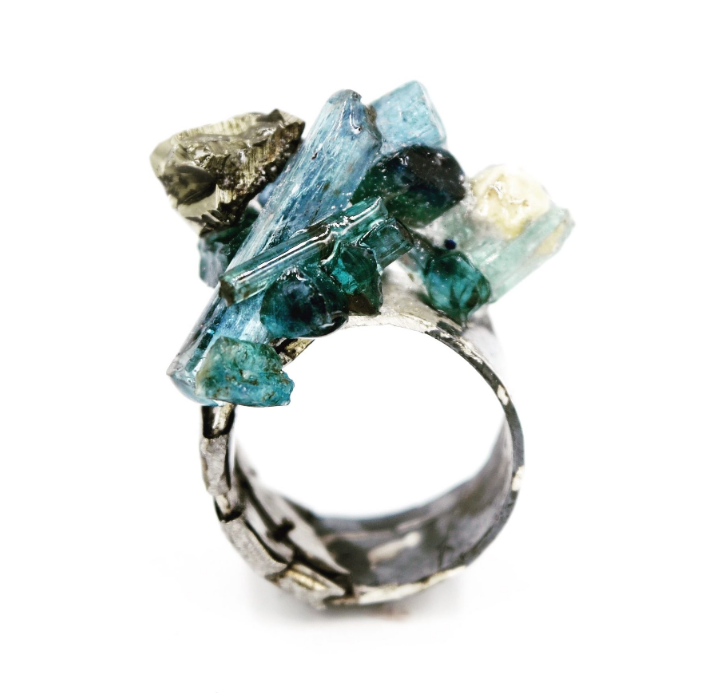 Art jewellery by Jill Herlands, ring with rough stones, on white background