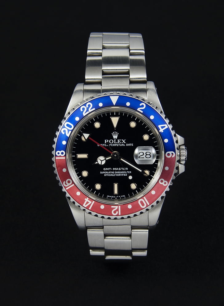 Rolex-GMT Master watch, from above, on black background