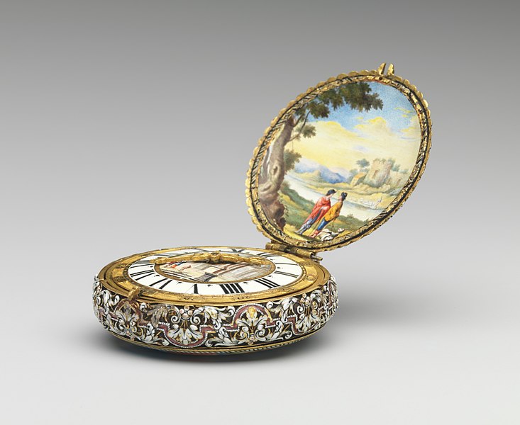 Decorated watch with paintings and repeated motif, on white surface - an example of watch aesthetics.