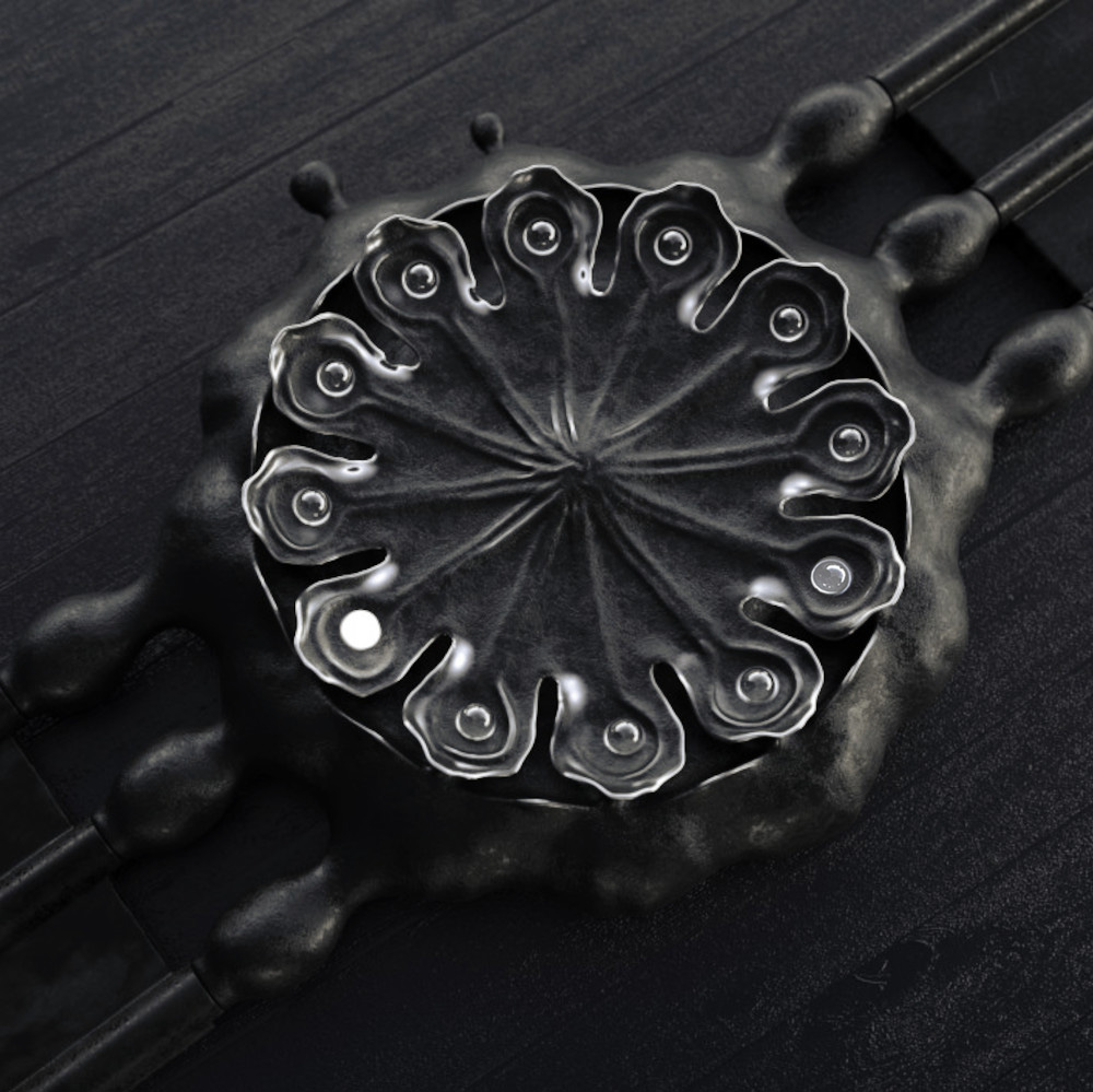 UnconstrainedTime Poppy seed pod watch in blackened silver, on a black surface.