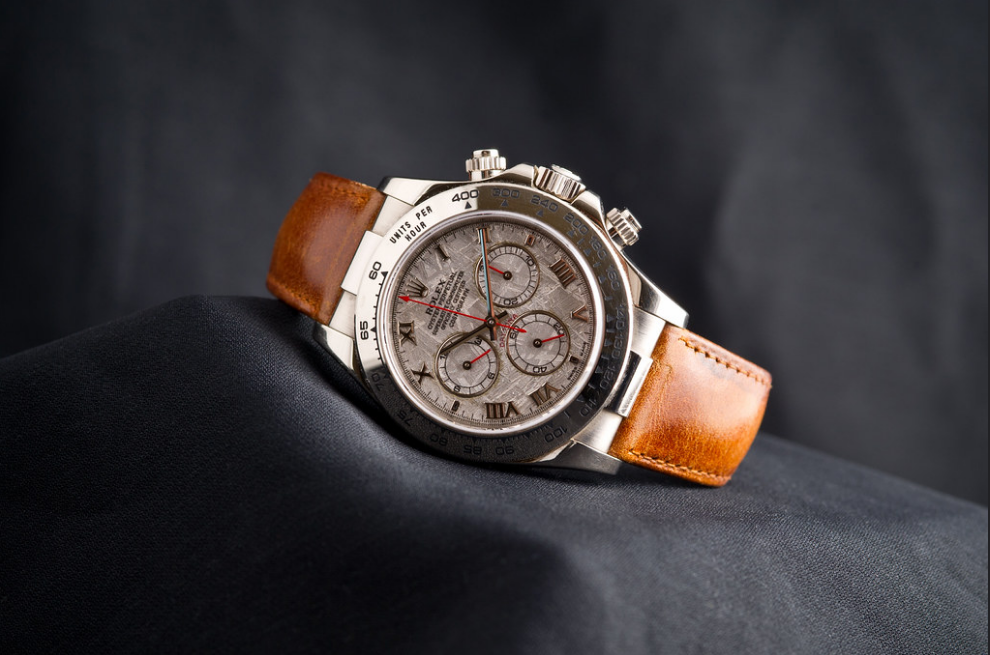 Rolex Daytona Meteorite watch, shown resting on dark fabric.