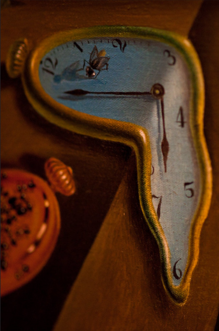 Dali’s painting ‘The Persistence of Memory" showing a clock melting over an angle.