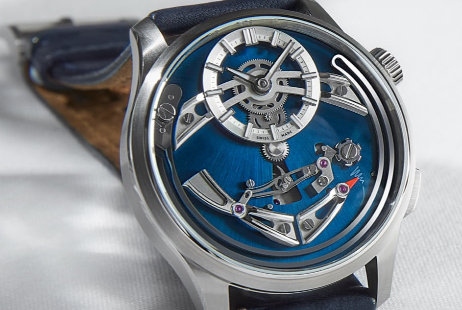 Christopher Ward C1 Be Canto - a watch with a chime, blue central area, shown on white surface.