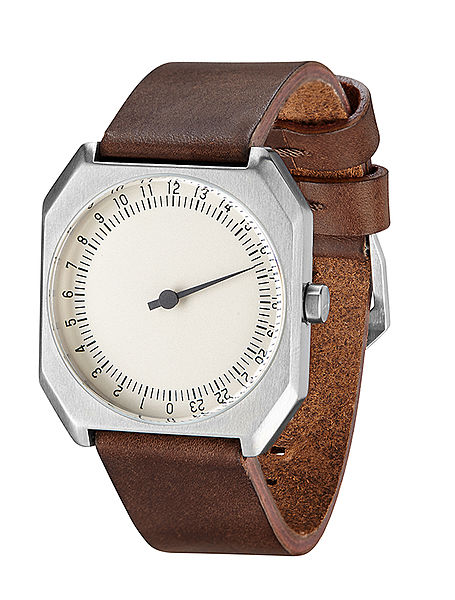 slow Jo microbrand watch, single hand, brown leather strap, isolated on white background.