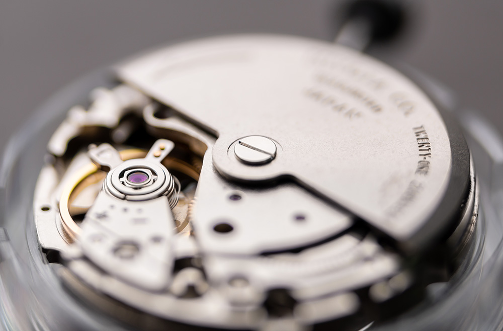 A watch movement, shallow depth of field.