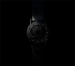 Techno-circle #1 watch, black, lit from the side, black background - thumbnail