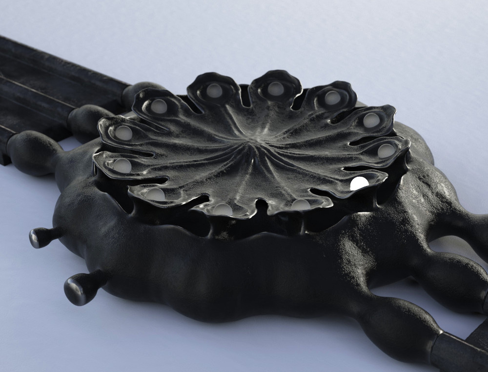 Poppy Seed Pod watch in black patinated bronze on a white surface