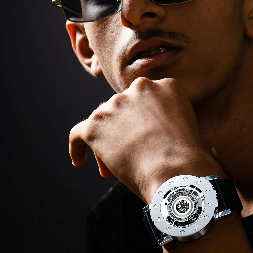 Techno-circle #1 wristwatch in polished aluminium worn on a man's wrist