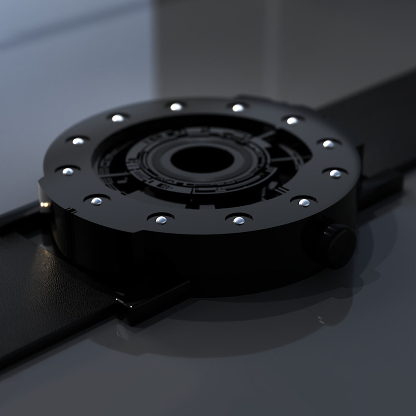Techno-circle watch in black anodized aluminium, on a dark shiny surface.