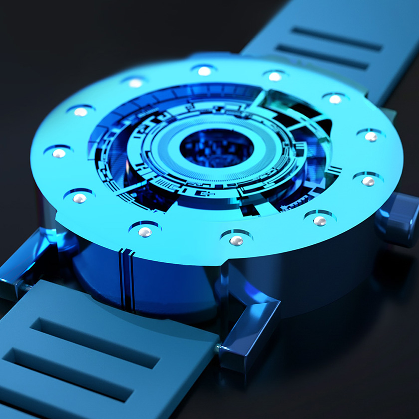 Techno-circle watch in cyan anodised aluminium with rubber strap, on black surface.