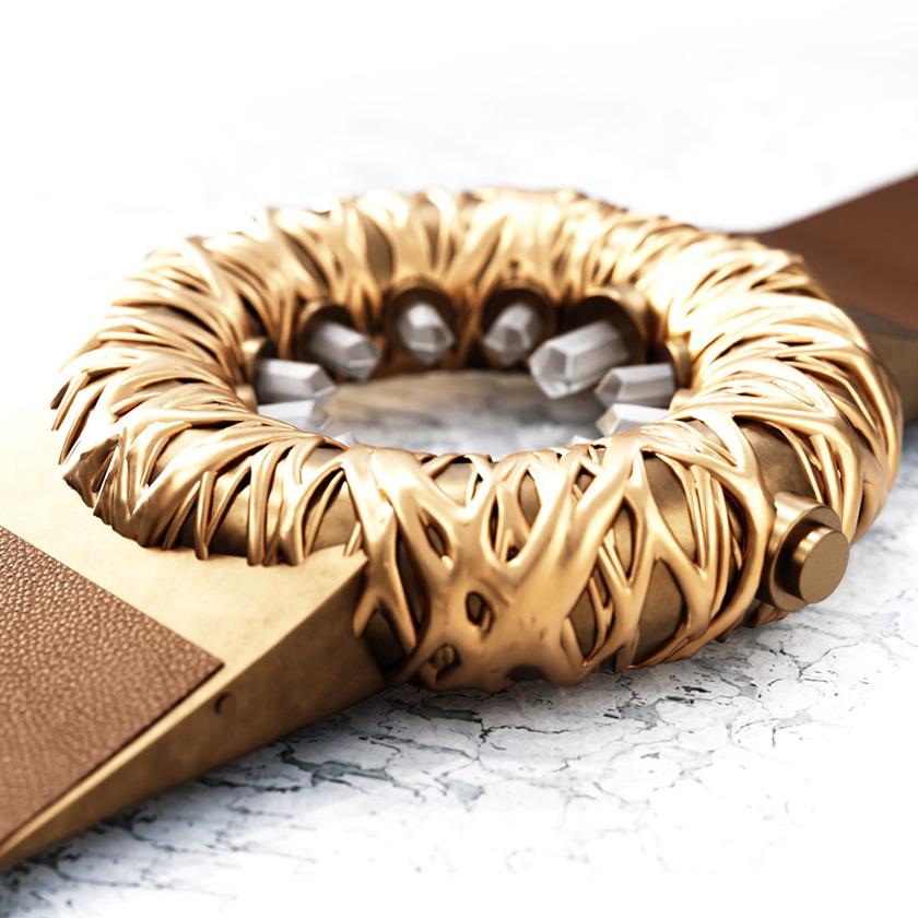 Tropical Crystal wristwatch in bronze on a white marble surface.