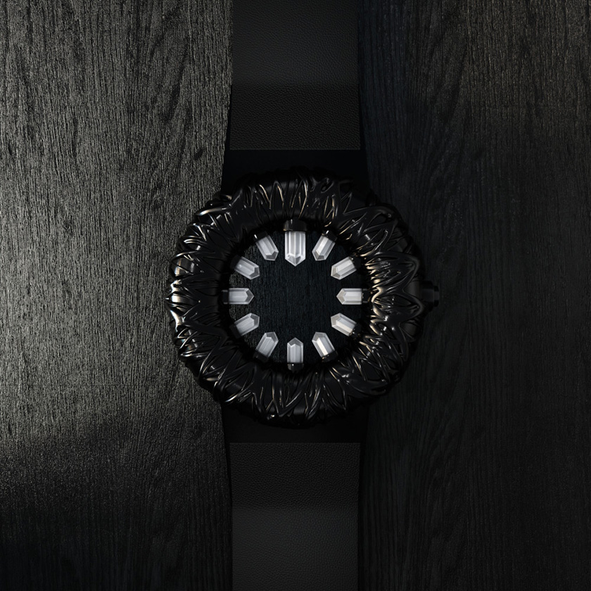 Tropical Crystal wristwatch in black, top-down view, on a black wood surface.