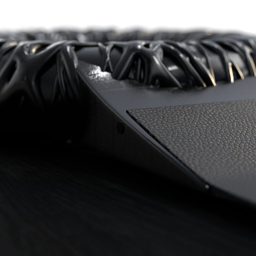 Tropical Crystal wristwatch in black, shallow angle, shallow depth of field, on a black surface.