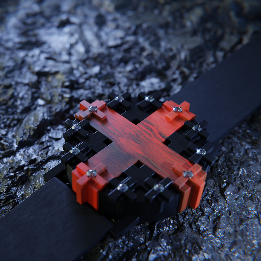 UnconstrainedTime Cross #1 watch in black patinated bronze with yew wood, on a rough black stone surface.