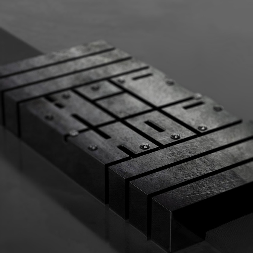 Hip Hop #1 wristwatch in blackened distressed steel, on a dark surface.